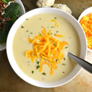 Cauliflower Cheese Soup - A copycat recipe from Zupas with some adaptations. I love this creamy and healthy soup. Use raw cheddar and raw milk for some added probiotics. This recipe is so easy and so delicious! | twothirdscup.com